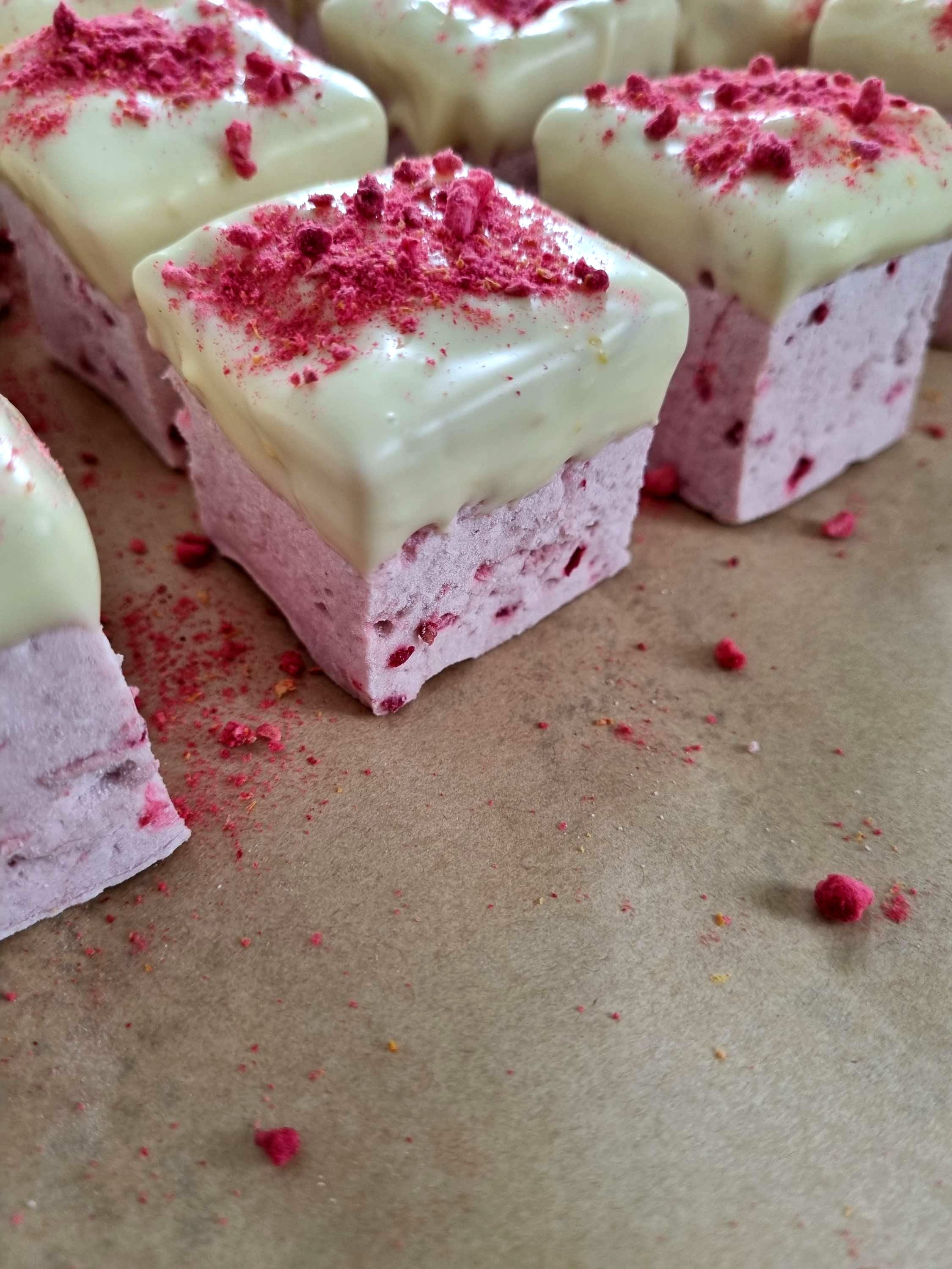 Raspberry & Lemon White Chocolate Marshmallow, on top of a brown baking paper.