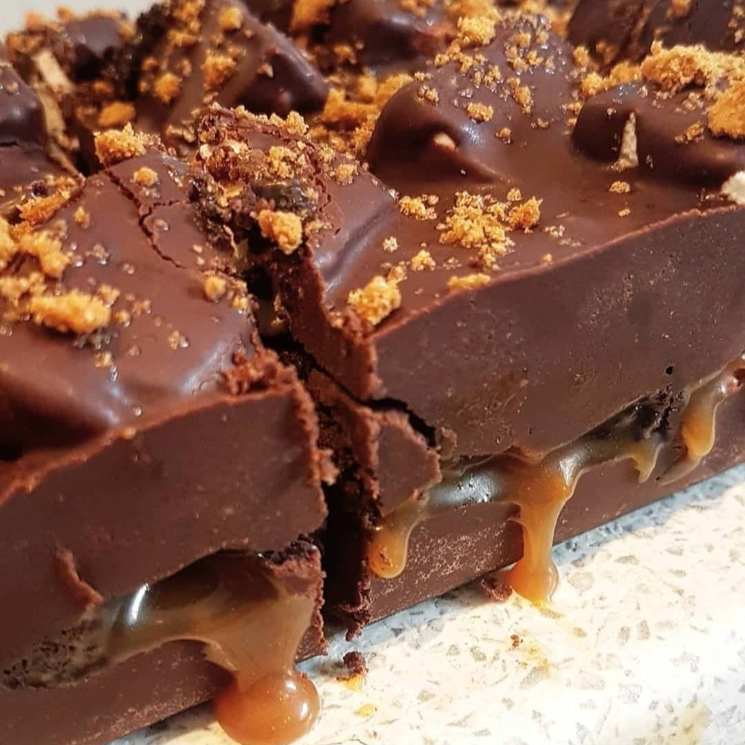 layered chocolate, marshmallow, brownie, biscuit rocky road, with salted caramel dripping from the holes.